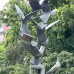 9 Tauben aus Metall